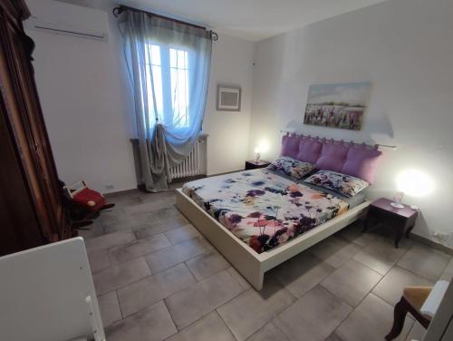 Postel nebo postele na pokoji v ubytování Casa Lilly