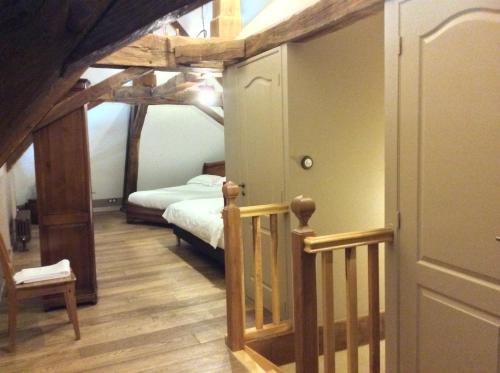 Кровать или кровати в номере Domaine de Noyer