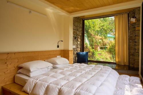 Postel nebo postele na pokoji v ubytování Seegreen Lodges