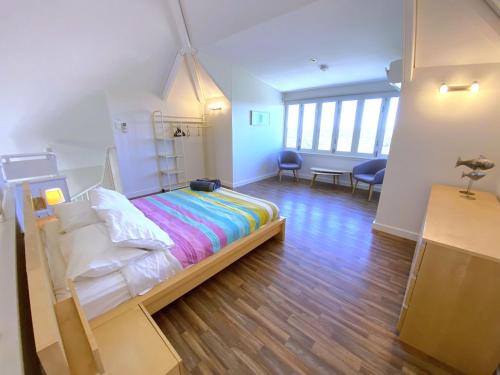 Katil atau katil-katil dalam bilik di Osprey Holiday Village Unit 105