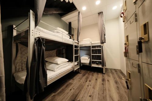 Cama o camas de una habitación en 小艾背包客棧 Small Eye Backpacker