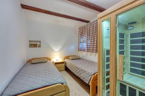 Cama o camas de una habitación en Merry's Spa and Relax House - Happy Rentals