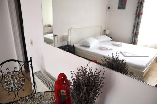 Postel nebo postele na pokoji v ubytování Taxi Hostel
