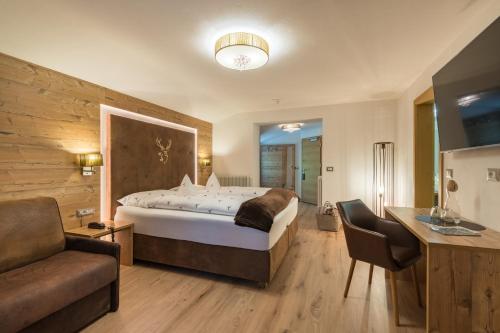 Postel nebo postele na pokoji v ubytování Hotel Jägerheim 3S