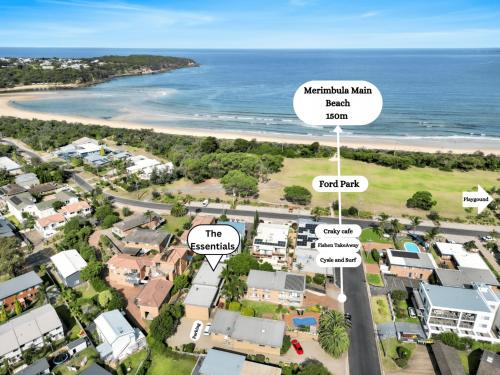 an aerial view of a neighbourhood with houses and the ocean at The Essentials Unit 2 - 1 Marine Parade in Merimbula