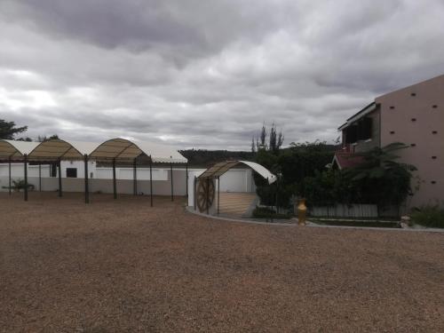 a group of buildings with domed roofs and a fire hydrant at Résidence La Tonnelle in Antananarivo