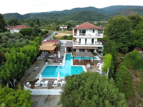 an aerial view of a house with a swimming pool at Agorastos Luxury Living in Platamonas