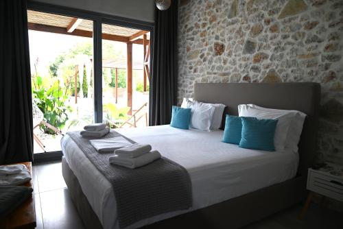 Postel nebo postele na pokoji v ubytování Agorastos Luxury Living