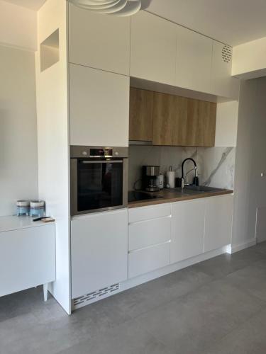 Dapur atau dapur kecil di Natural Darłówko Emilia Strupiechowska