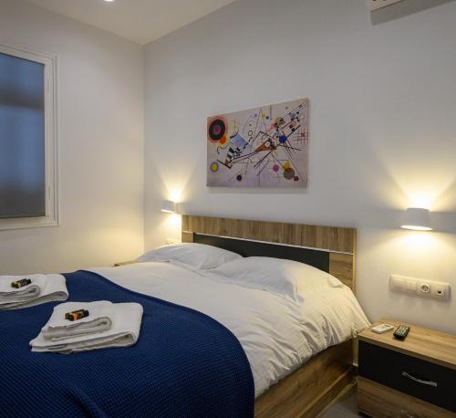 Una cama o camas en una habitación de Ilianas Home