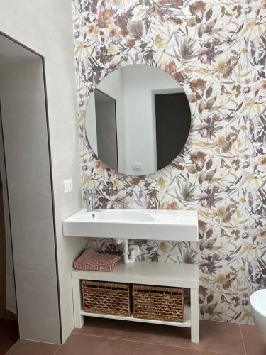 TV a/nebo společenská místnost v ubytování B&B I versi del mare