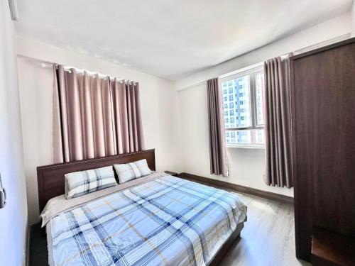 Postel nebo postele na pokoji v ubytování Windy homestayPR