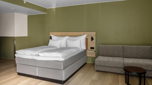 Postel nebo postele na pokoji v ubytování Comfort Hotel Trondheim