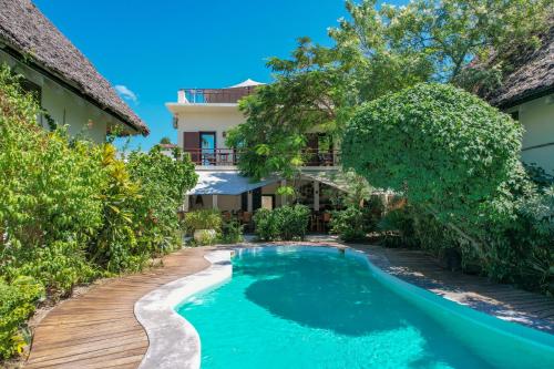 Πισίνα στο ή κοντά στο Jambiani Villas