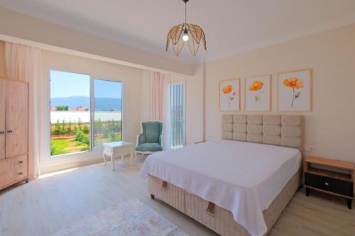 Ένα ή περισσότερα κρεβάτια σε δωμάτιο στο Villa Belis
