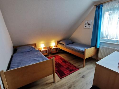 Postel nebo postele na pokoji v ubytování FHKlützke Deichblick