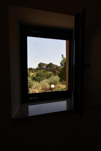 a window in a room with a view of a field at Dream House in Piazza Armerina