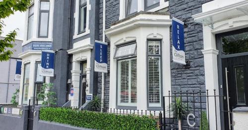 a building with blue and white signs on it at The Clifton in South Shields