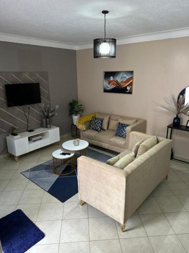 Χώρος καθιστικού στο Nkuyu estates