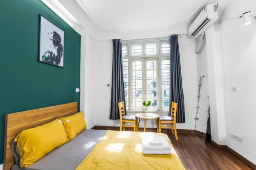 Khu vực ghế ngồi tại Sisan Homestay 45 Kim Mã Thượng 1 phòng ngủ