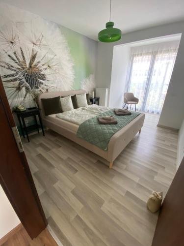 Katil atau katil-katil dalam bilik di Erkel 19 Apartmanház