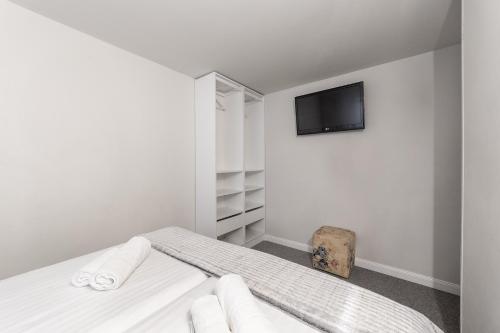 Кровать или кровати в номере Eden Grand Resort