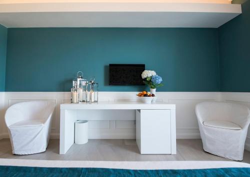 TV/Unterhaltungsangebot in der Unterkunft Bianco Riccio Suite Hotel