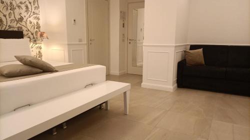Ein Sitzbereich in der Unterkunft Bianco Riccio Suite Hotel