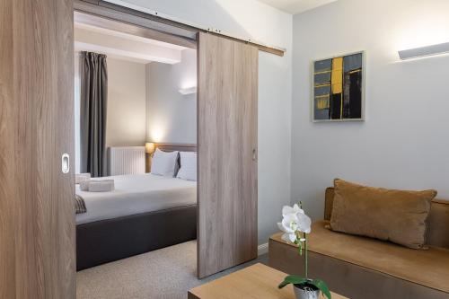 Кровать или кровати в номере Eden Grand Resort