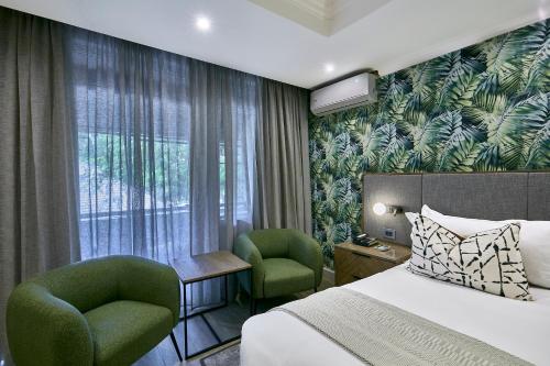 Postel nebo postele na pokoji v ubytování Cresta Thapama Hotel