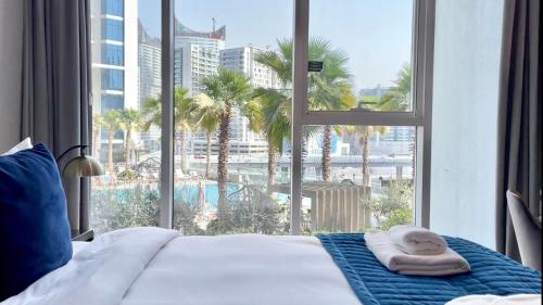 Postel nebo postele na pokoji v ubytování Vacay Lettings - Damac Prive studio