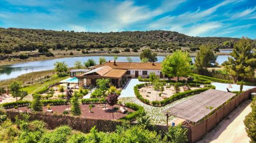 an aerial view of a house with a garden at Casas Rurales Laguna La Tinaja in Ossa de Montiel