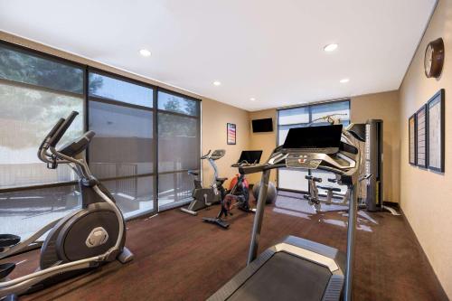 a gym with two tread machines and a treadmill at Comfort Inn & Suites Las Vegas - Nellis in Las Vegas