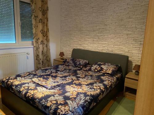 En eller flere senge i et værelse på Casa Nich