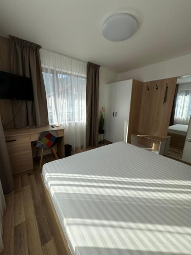 Ένα ή περισσότερα κρεβάτια σε δωμάτιο στο B&B rooms