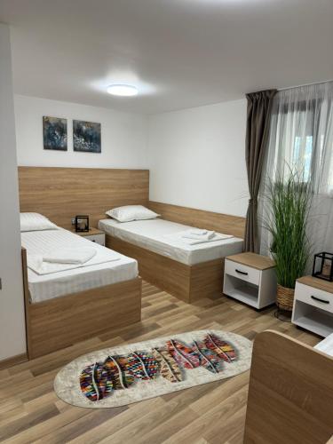 Ένα ή περισσότερα κρεβάτια σε δωμάτιο στο B&B rooms