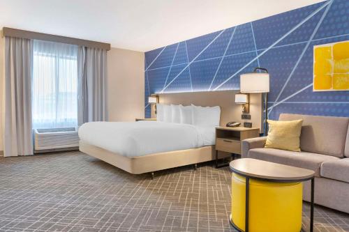 Ένα ή περισσότερα κρεβάτια σε δωμάτιο στο Comfort Inn & Suites Rapid City near Mt Rushmore