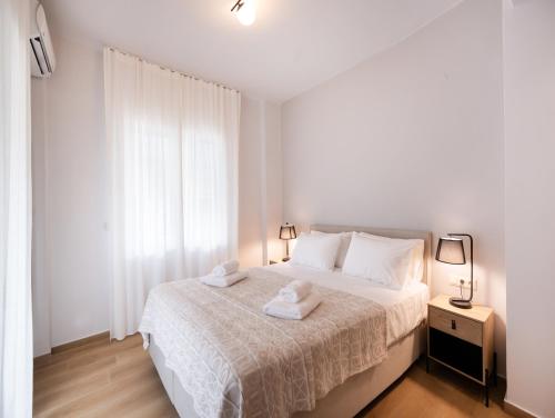 Postel nebo postele na pokoji v ubytování LefkasEscape