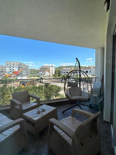 a living room with a view of a city at Brand New Apartament in Golem