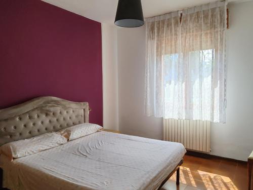 Postel nebo postele na pokoji v ubytování La Rondinella