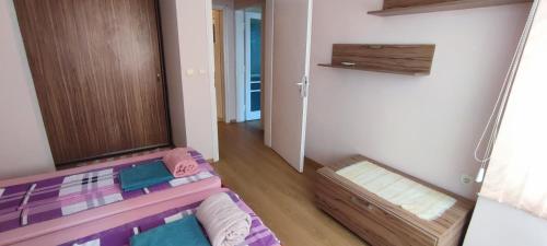 Postel nebo postele na pokoji v ubytování Central Base Varna