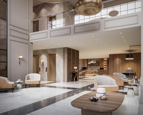 a lobby with white chairs and a table at Treat Hotel Nashik City Center in Nashik