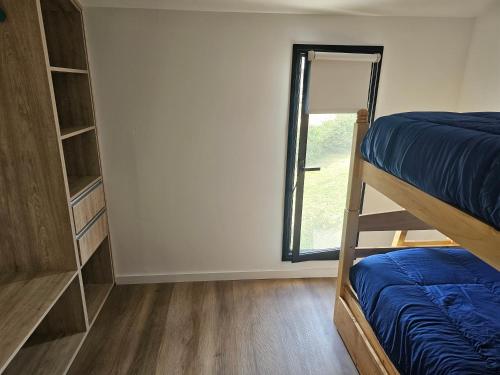 Un pat sau paturi într-o cameră la Casa5
