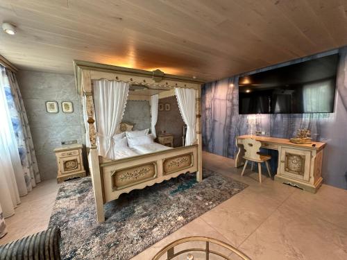 Postel nebo postele na pokoji v ubytování Hotel Fohlenhof