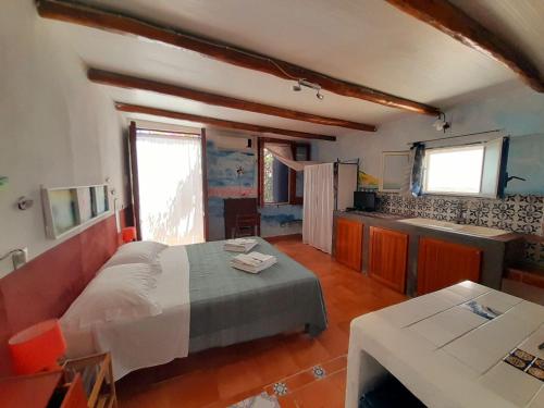 Ένα ή περισσότερα κρεβάτια σε δωμάτιο στο Villino Miraglia