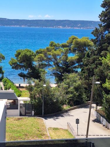 a view of the ocean from a house at Penthouse FRANITA 50 meters from the beach in Kaštela