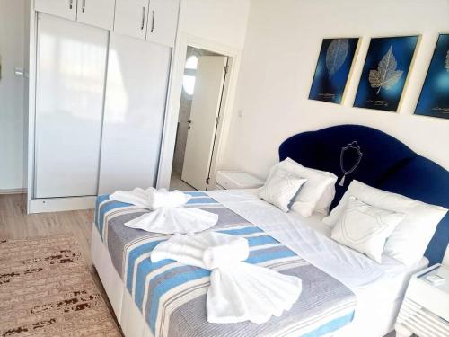 Ένα ή περισσότερα κρεβάτια σε δωμάτιο στο Vitus Apartments in Caesar Resort & Spa