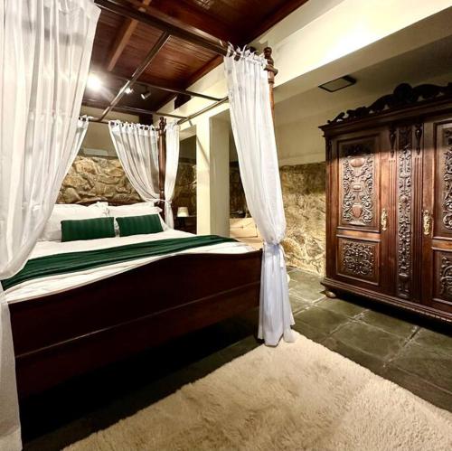 Postel nebo postele na pokoji v ubytování Quarto dos Vinhos