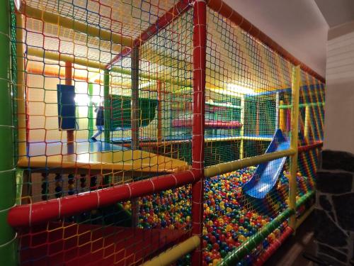 a large cage filled with lots of balls at Ostoja Zaskalskie Apartament DIAMENT 100 m2, 56m2 in Jaworki