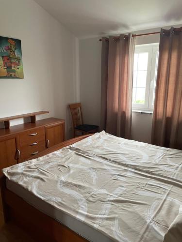 Apartma Metulj Koper - Newにあるベッド
